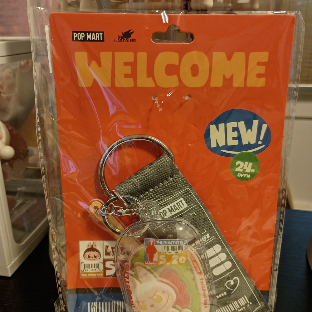 Popmart Exclusive Overseas Welcome Party Keychain Set - Orange and Silver.